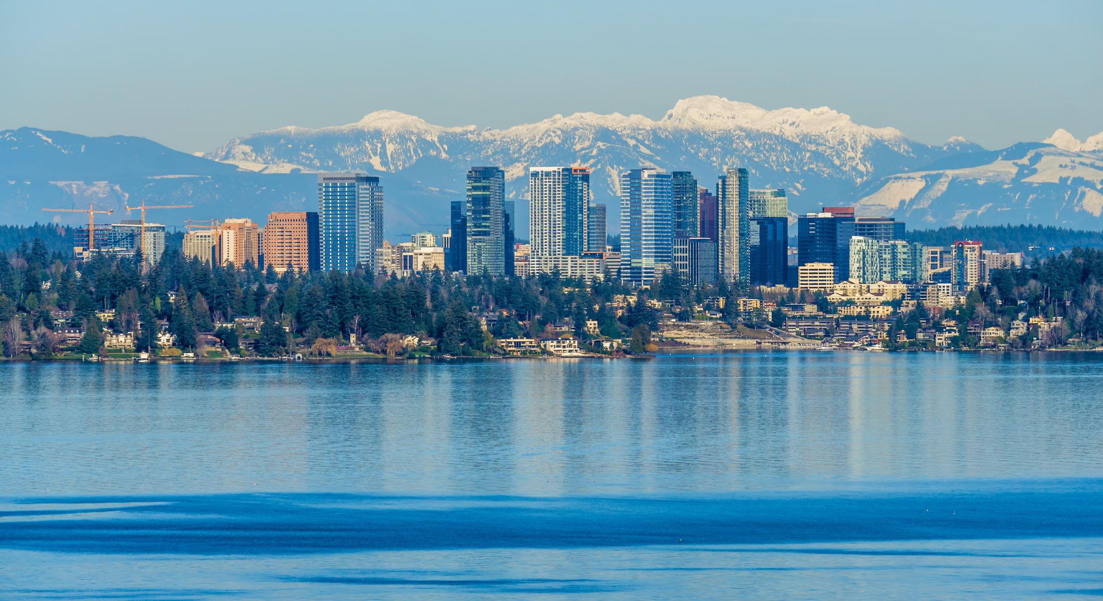 bellevue wa sky line with mountains in the background