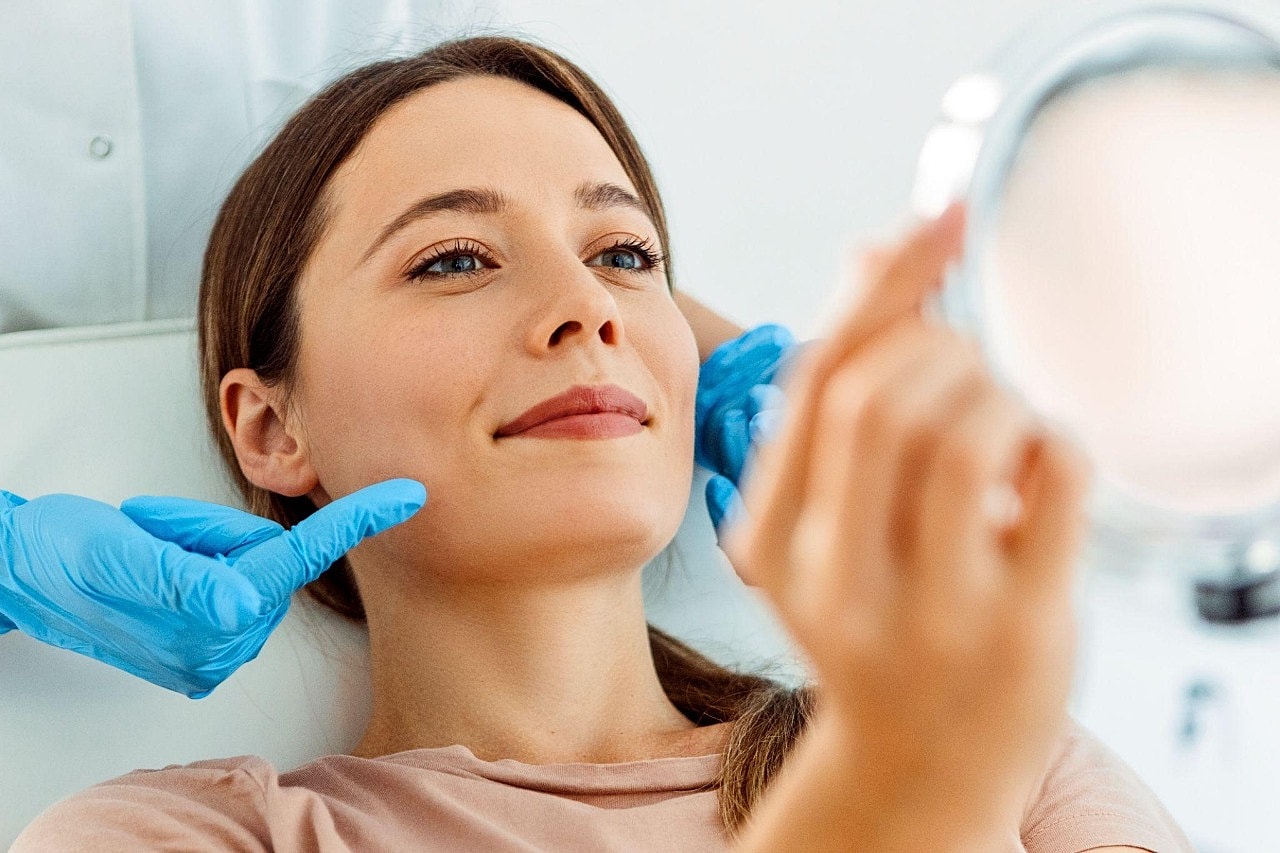 What To Expect From Your Resultsreceiving skincare treatment at clinic.